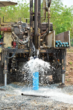 The water flowing artesian well from the land