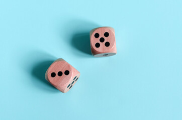 Dice with the numbers three and five on a light background. dice kopi space