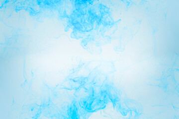 Fototapeta na wymiar blue water dissolving abstract background on a white background
