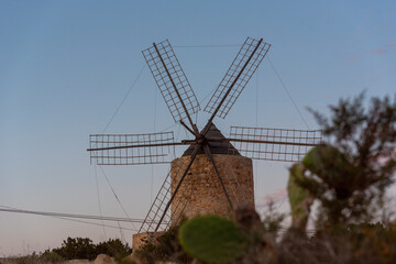 Silhouettes of the mill of Jeroni, Sa Miranda on the island of Formentera in Spain