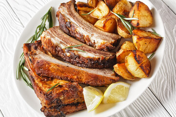 grilled pork ribs served with roast new potatoes