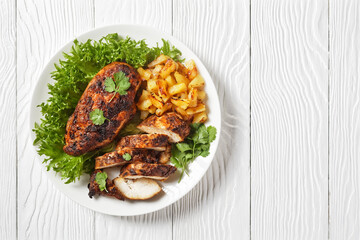 Jerk chicken breasts with grilled ananas cubes