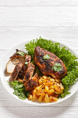 Jerk chicken breasts with grilled ananas cubes