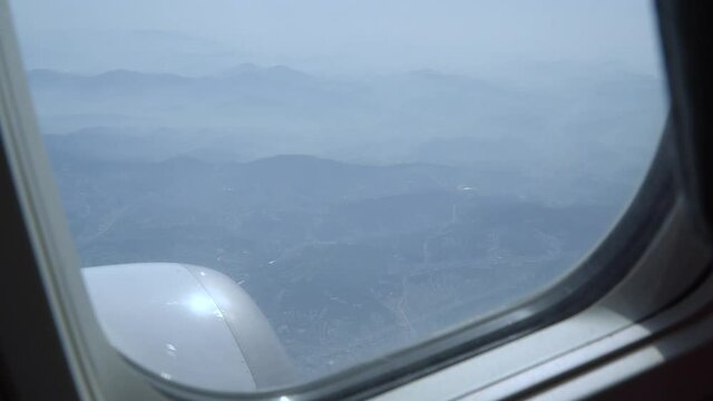 POV Of A Person Enjoying The View From Window Of A Plane.