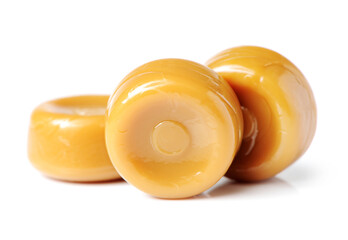 Milk caramel, hard sugar candies, boiled sweets isolated on white background