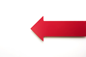 Big real red arrow for presentation or slideshow. pointing left for, back or return. Natural white...