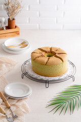 A chiffon cake is a very light cake made with vegetable oil, eggs, sugar, flour, baking powder, and...
