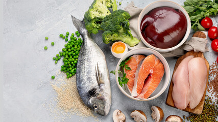 Food high in iron on light gray background. Healthy eating concept.