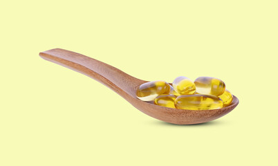 Cod liver oil  on yellow background