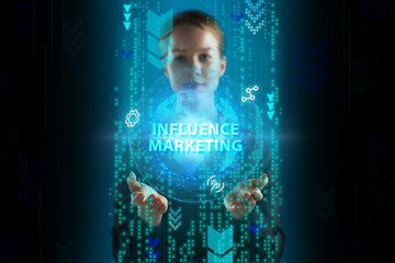 Business, Technology, Internet and network concept. Young businessman working on a virtual screen of the future and sees the inscription: Influence marketing