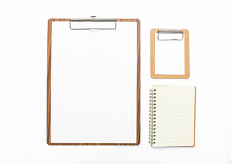 Wooden clipboard with blank paper and notebook isolate on white background, education and...