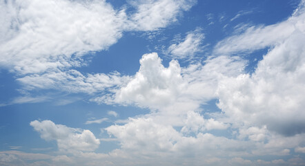 Obraz premium Many small clouds in blue sky.Summer cloudy.White clouds floating in the sky.