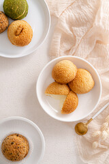 Choux pastry  is a delicate pastry dough used in many pastries. It contains only butter, water, flour, and eggs. Choux pastries are sometimes filled with cream after baking to make cream puffs 