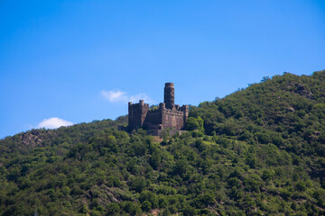 Panoramic view from the historic Maus Castle on the hill between a beautiful forest, Sankt Goar,...