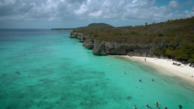  Cas Abou Beach on the Caribbean island of Curacao, Playa Cas Abou in Curacao Caribbean tropical white beach with the blue ocean. drone footage