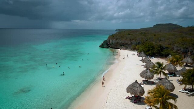  Cas Abou Beach on the Caribbean island of Curacao, Playa Cas Abou in Curacao Caribbean tropical white beach with the blue ocean. drone footage