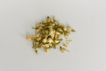 Dried jasmine flower on isolated white background