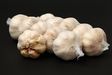 garlic on a black background