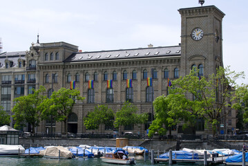 Fototapeta na wymiar LGTBQ flags at historic post building at City of Zurich. Photo taken June 20th, 2021, Zurich, Switzerland.