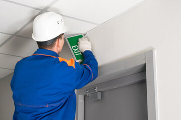 installation of emergency exit lighting is in progress