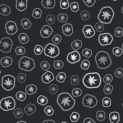 Grey Shield and marijuana or cannabis leaf icon isolated seamless pattern on black background. Marijuana legalization. Hemp symbol. Vector Illustration