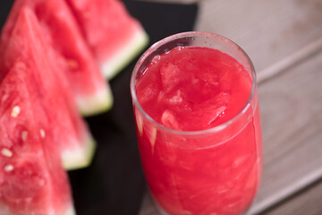 Watermelon and a glass of watermelon juice