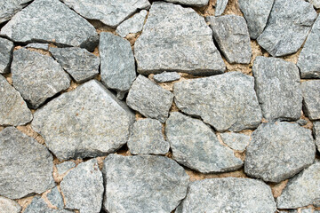 Nature stone on the ground at coast.