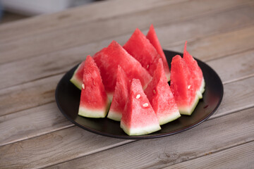A plate of cut fresh watermelon
