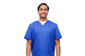 Fototapeta premium healthcare, profession and medicine concept - happy smiling indian doctor or male nurse in blue uniform over white background