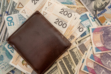 US dollar with polish zloty bills wallet business background