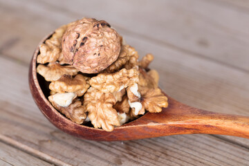 Walnuts and walnuts in a spoon