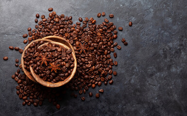 Roasted coffee beans in wooden bowl