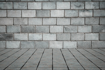 Empty room with bricks wall and tiled floor.