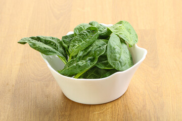 Fresh green spinach leaves in the bowl