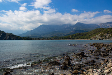 The rocky shore of the bay in the Mediterranean Sea