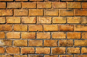 Ancient brick wall. Old red brick wall with interesting structure. Handmade brick textured unique...