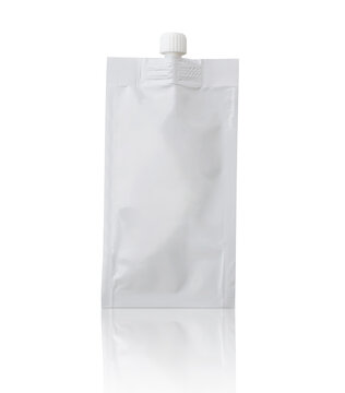 Blank white cosmetic cream sachet with plastic cap isolated on white background