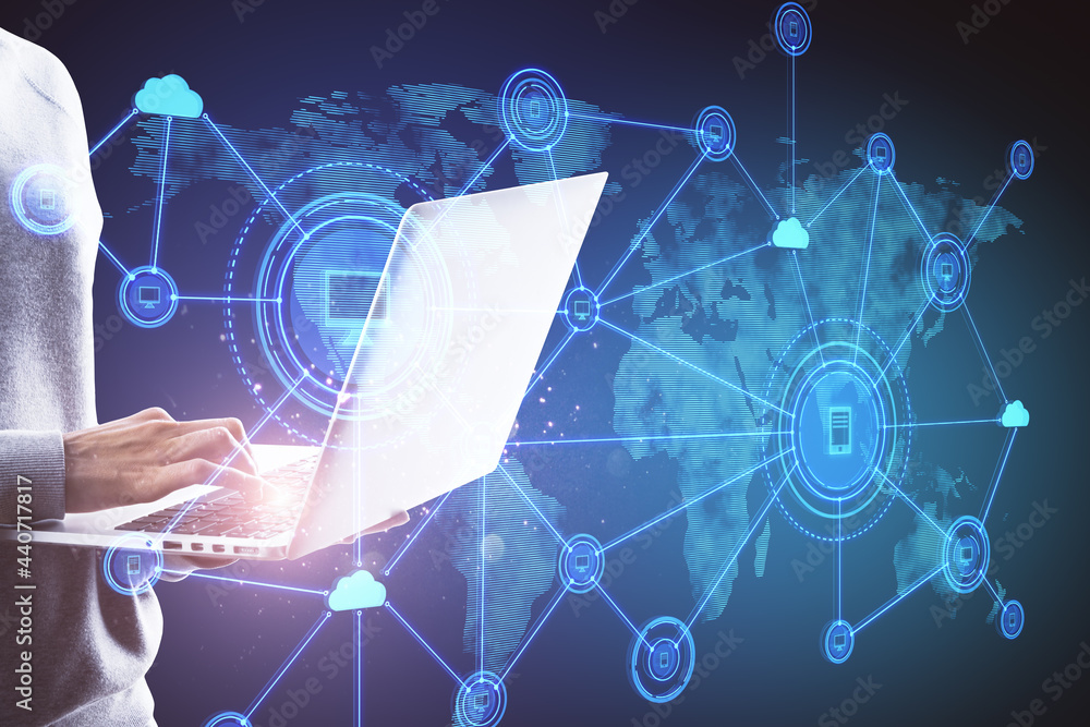 Aufkleber Hand using notebook with abstract computer map and digital icons hologram on blue background. Cloud computing and data storage concept.