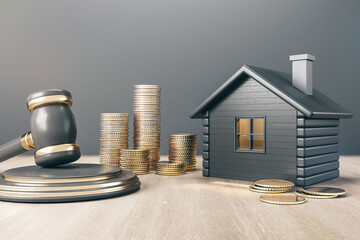Black house with golden coin stacks and gavel on concrete and wooden background. Divorce and...