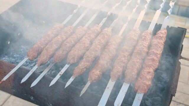 Fry lula kebab on skewers. Selective focus.