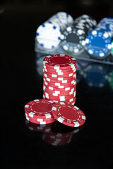 Casino chips on black background isolated