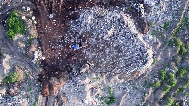 Aerial view of stack of different types of large mountain garbage pile