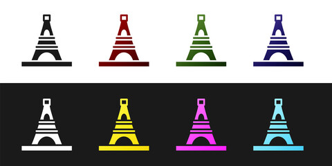 Set Eiffel tower icon isolated on black and white background. France Paris landmark symbol. Vector