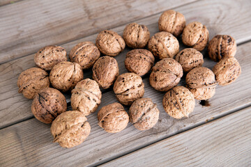 Walnuts on wooden background