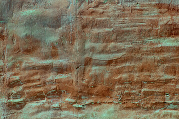 wavy old red wall, surface with damaged plaster