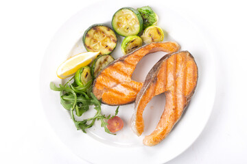 Grilled salmon steak and vegetables