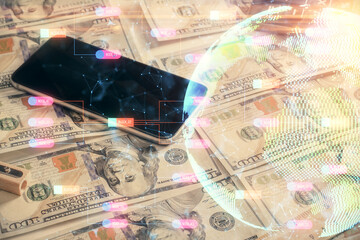 Double exposure of world map drawing over us dollars bill background. International concept.