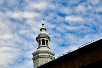 Built in 1757, the belfry with the Catholic church of St. Nicholas in the village of Ciemniewko in Masovia, Poland. The photos show a general view and architectural details of the temple and belfry.