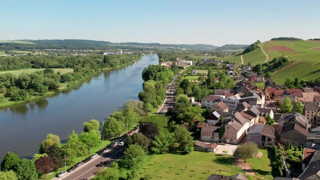 Aerial view of the Moselle river and vineyards in Remich, Luxembourg.