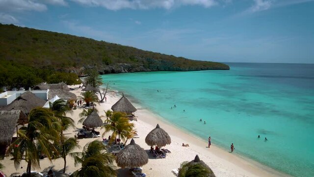  Cas Abou Beach on the Caribbean island of Curacao, Playa Cas Abou in Curacao Caribbean tropical white beach with the blue ocean. drone footage